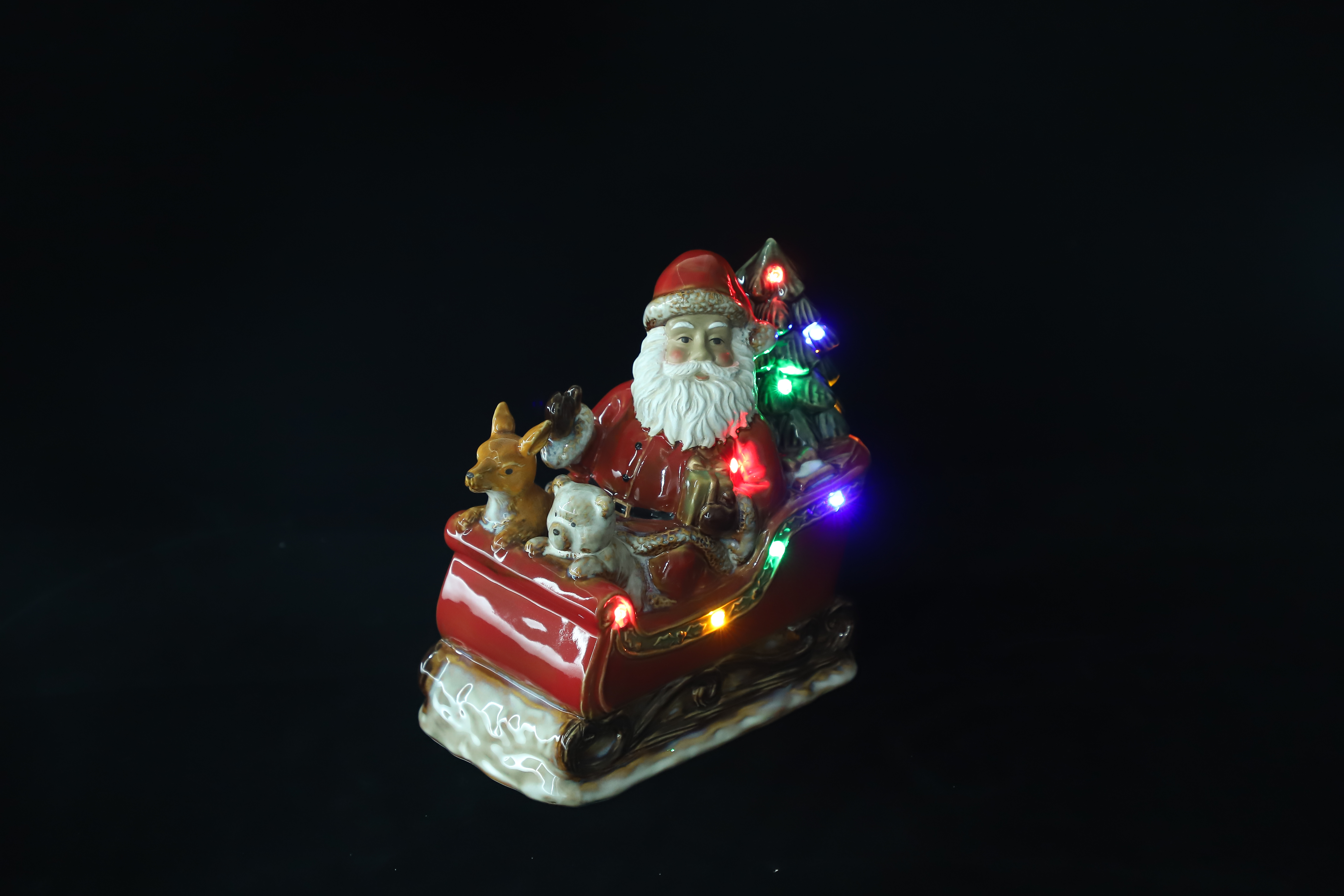 Lighted Comfy Hour 5" Festive Christmas Santa Sitting in Sled