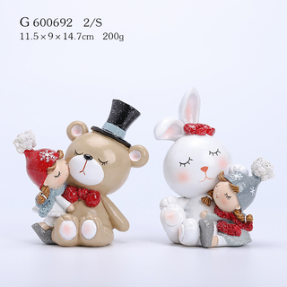 2/A Polyresin Girl Holding Bear And Bunny